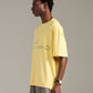 Reverse Logo Tee - Pale Yellow